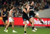 Carlton are relishing bumper crowds at the MCG and want more games there. (Rob Prezioso/AAP PHOTOS)